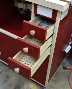 Small bit/accessory drawers on the right side.