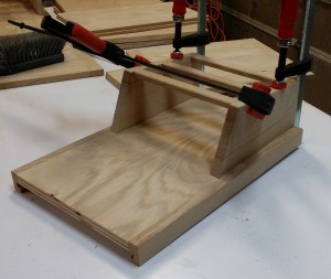 Fixed support and magazine rack glued and clamped.