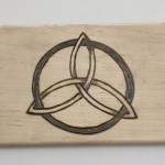 Celtic knot design, drawn and wood-burned by Anni